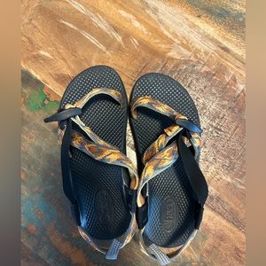 Orange and gray Chacos